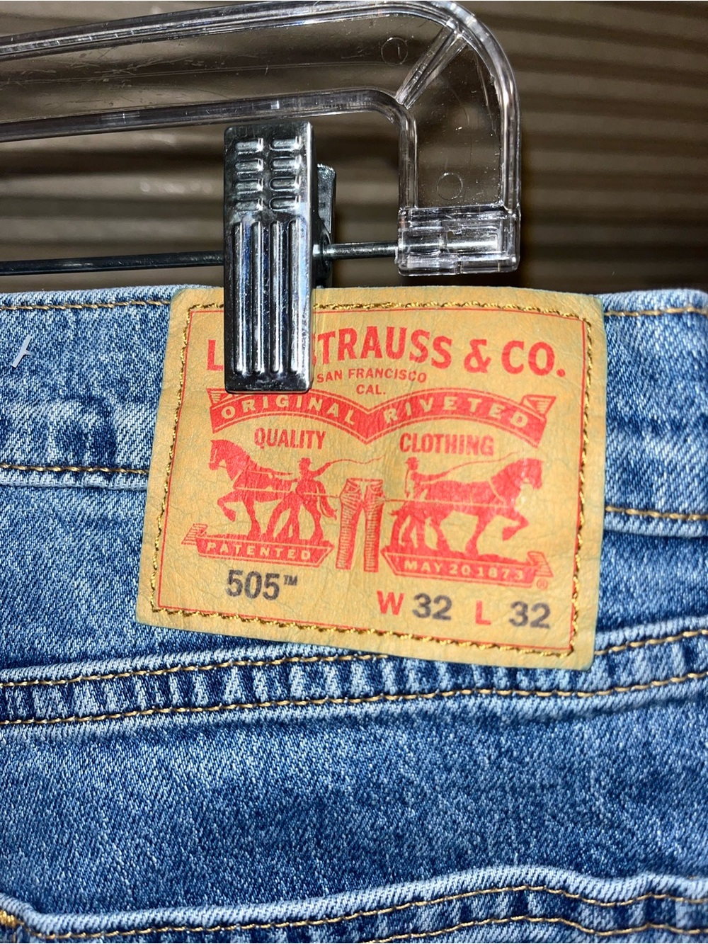 Levi's 505™ Straight Fit Jeans in Light Blue Denim with Tan Patch